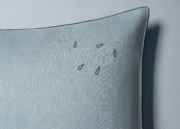 grey luxury throw cushion close up detail