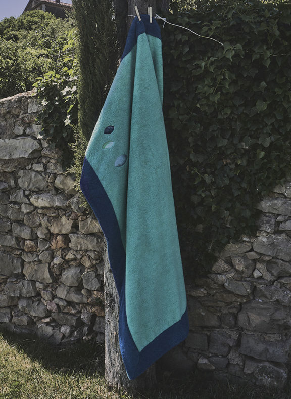 Galets beach towel hanging on a laundry line