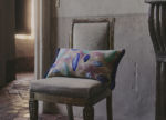 Pebble decorative pillow on chair